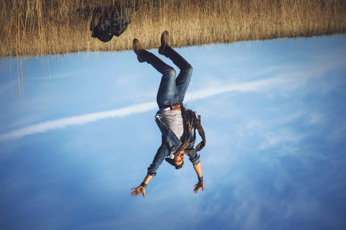 A man falling from the ground into the sky